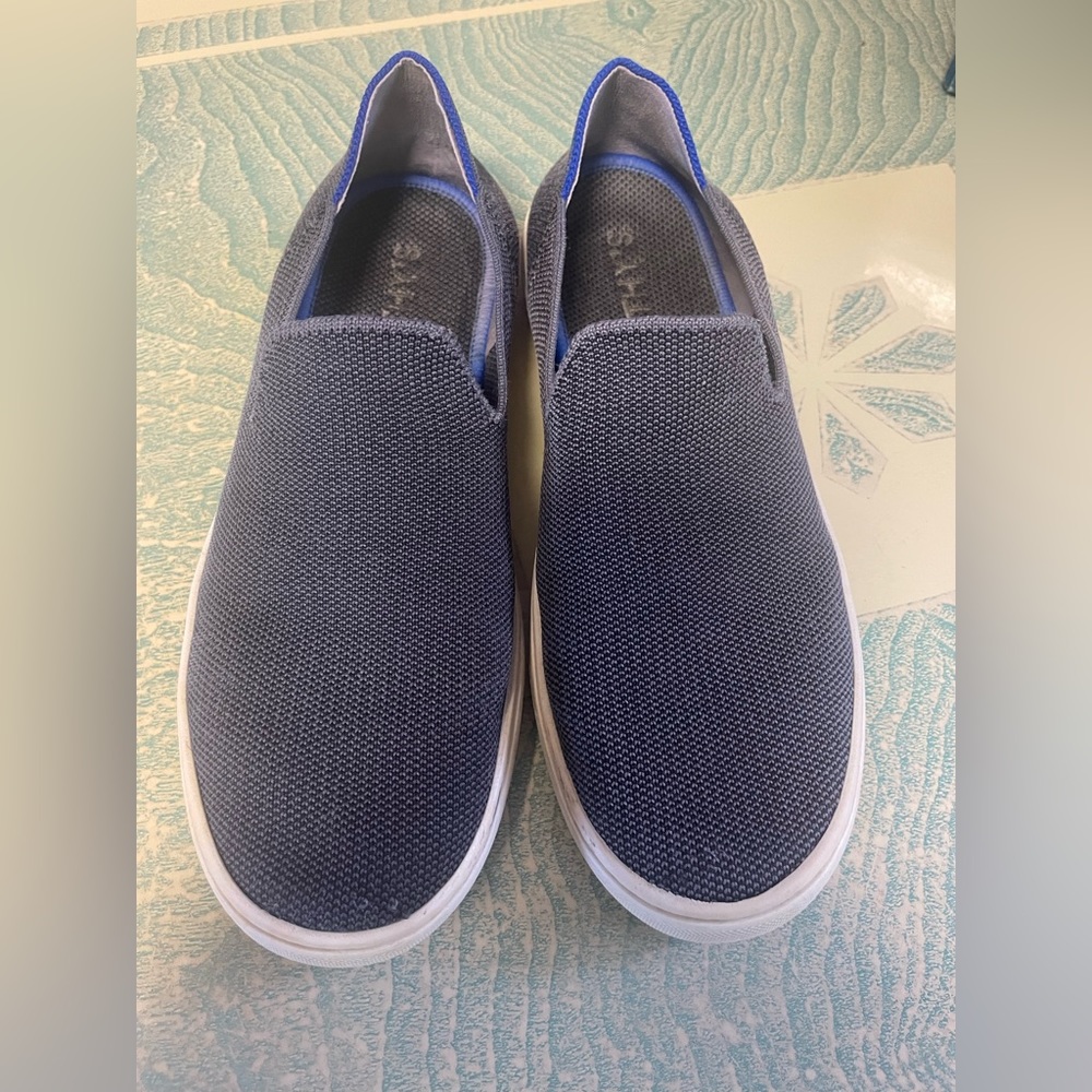 Rothy’s slip on sneakers. Dark grey. Loved condition but have life left.